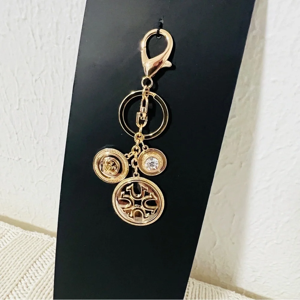 True Religion New Gold Tone Multiple Charms Medallion Key Holder Horseshoe Logo